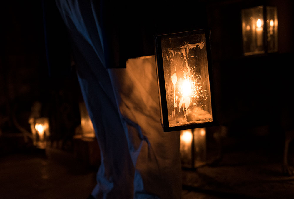 Lanterns hanging in the dark at the Ghost Tour